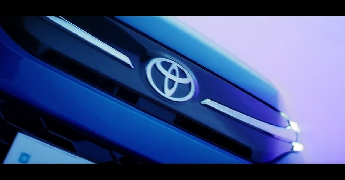 The teaser video hints at a Glanza-like grille