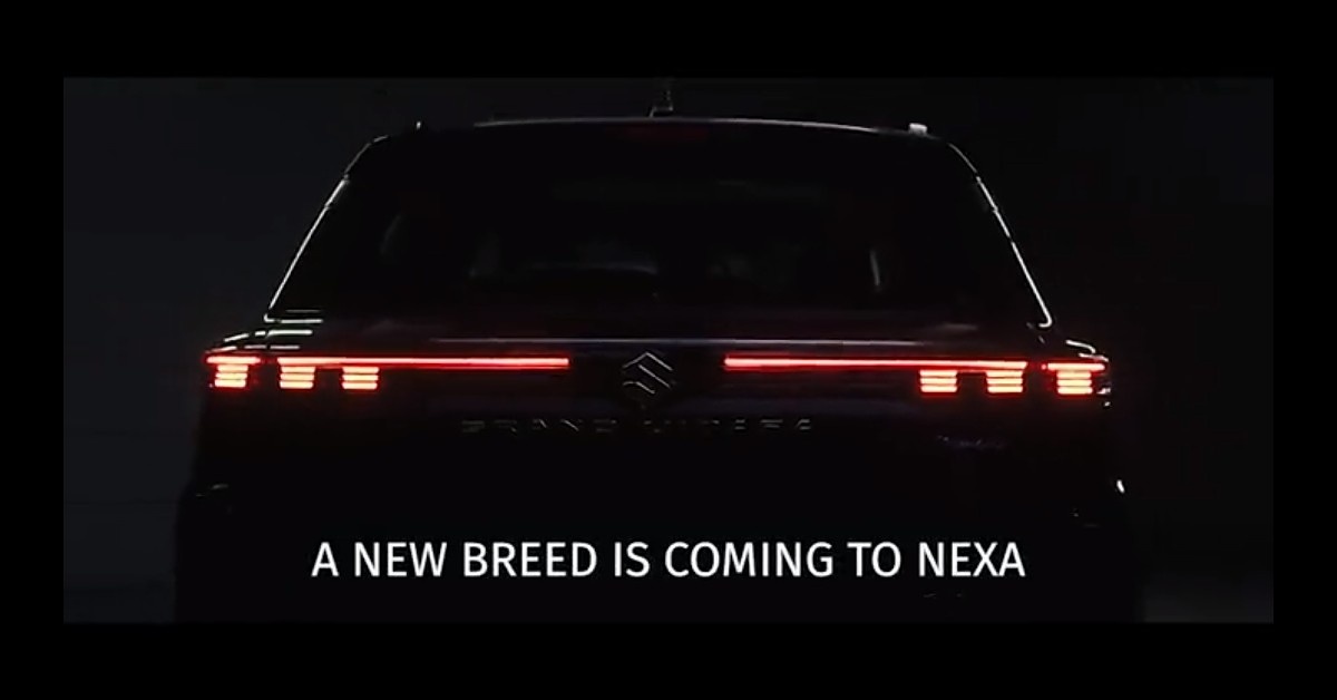 The rear end of the 2022 Maruti Grand Vitara features wrap-around LED tail lights